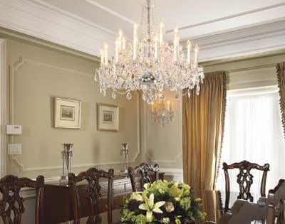 Soft formality of dining room is enhanced by tone-on-tone colour of panelling and moldings